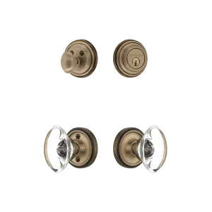 Classic Rosette Entry Set with Oval Clear Crystal Knob in Antique Brass