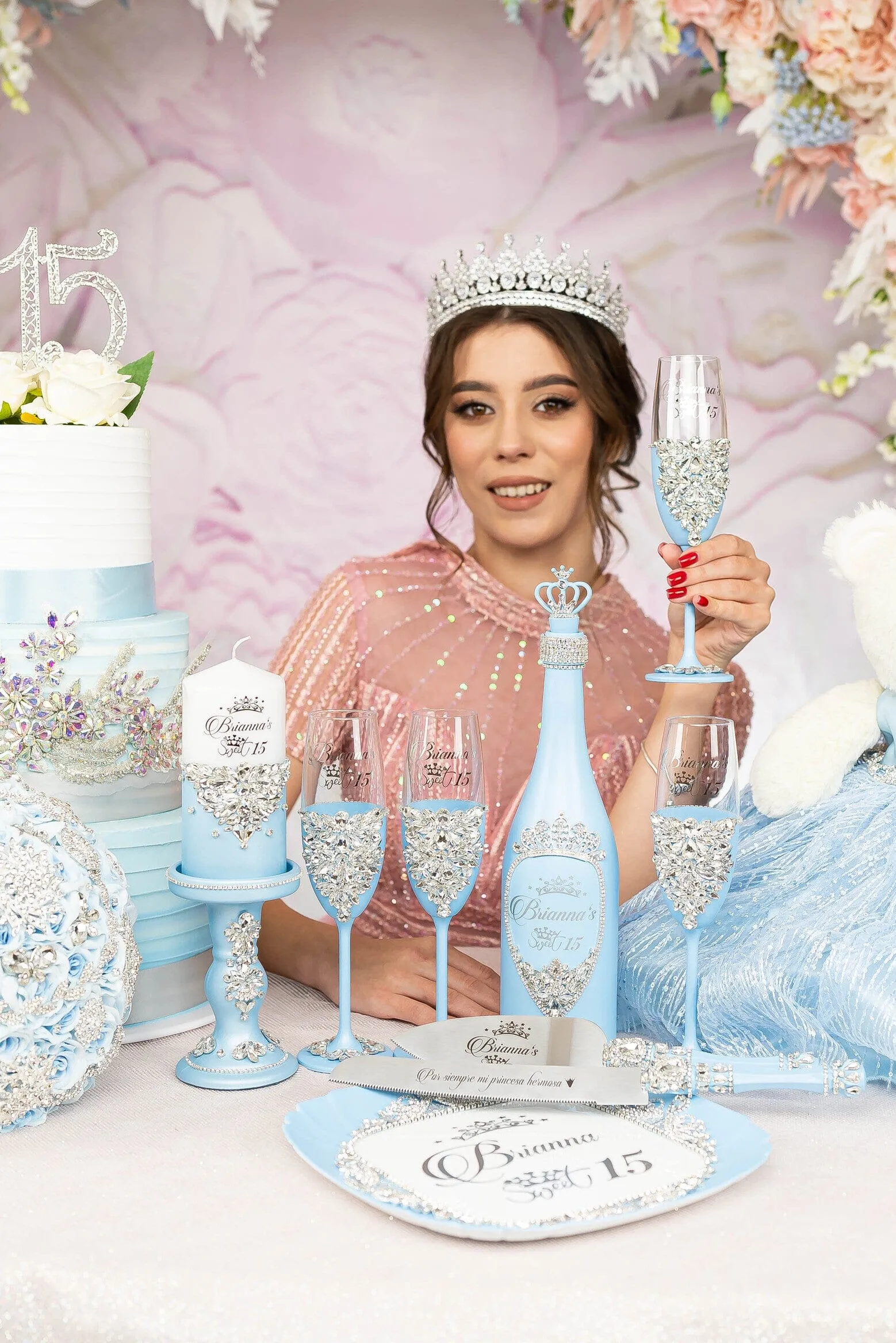 Light blue quinceanera brindis package with bottle and candle