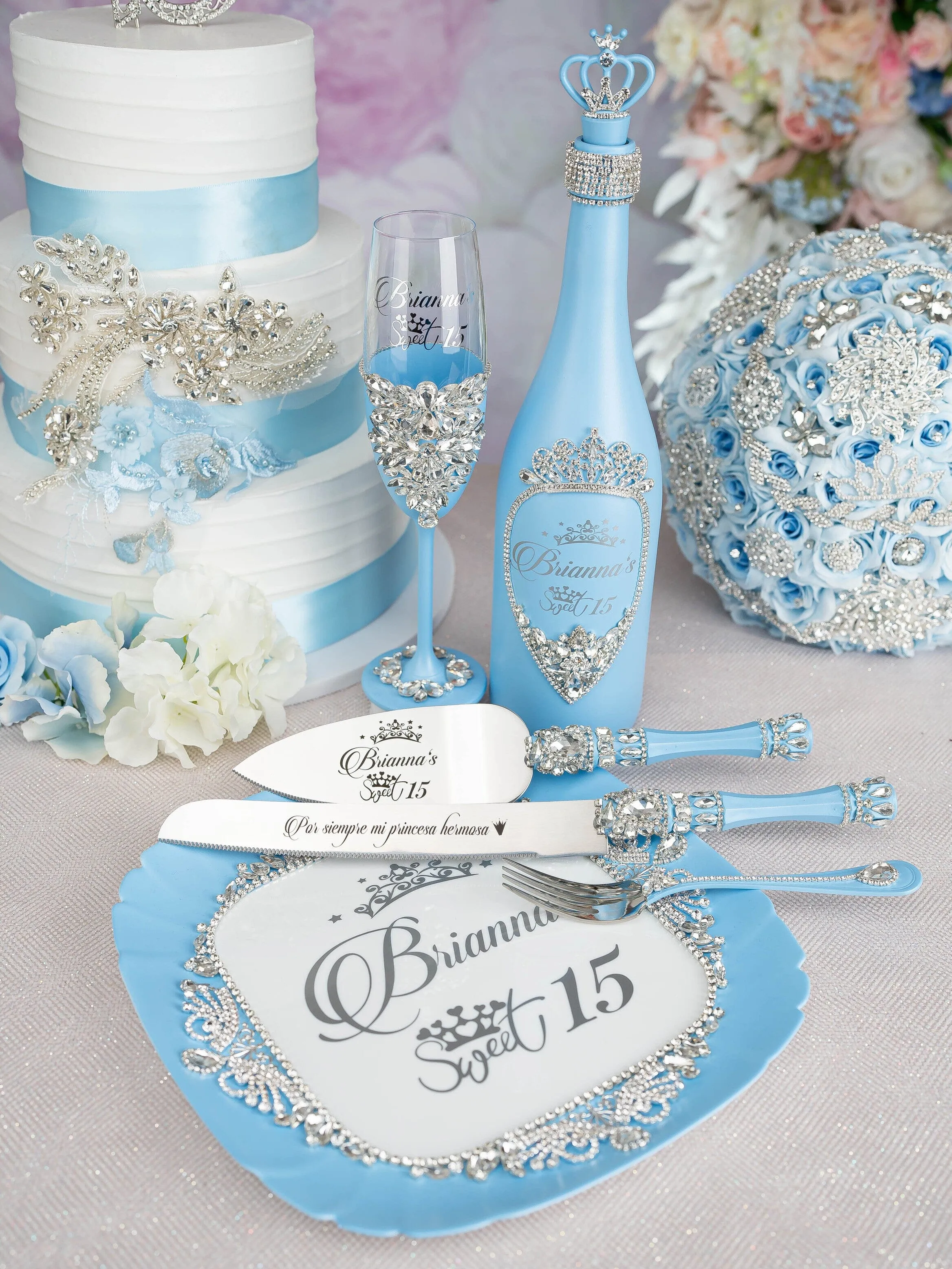 Light blue quinceanera brindis package with bottle and candle